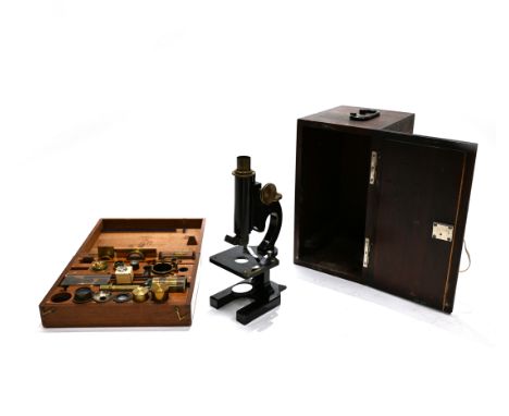 An early 20th century R &amp; J Beck of London microscope registration 30237 in box, marked BLKC 5 , together with Beck lense