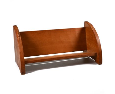 A Robert "Mouseman" Thompson oak book trough, with quarter circle ends and angled stand and rest, with signature mouse on the