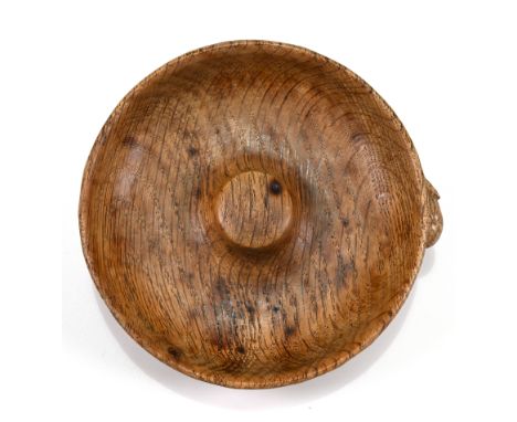 A carved oak pipe smoker's ashtray with central knop for "knocking out", with Robert "Mouseman" Thompson mouse carved onto th