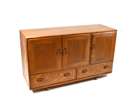 A classic Mid Century Ercol Elm Windsor Sideboard. Larger cupboard &nbsp;fitted with adjustable height shelf (present). W 130