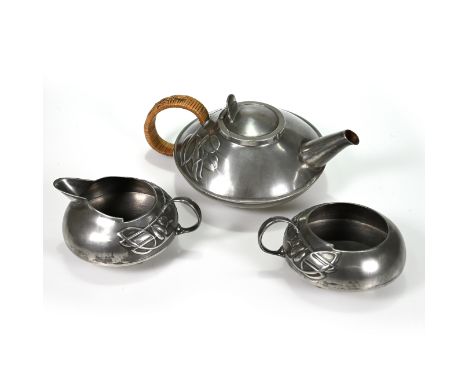 Archibald Knox for Liberty &amp; Co Pewter Tea Service comprising teapot, milk jug and sugar bowl in Art Nouveau style all be