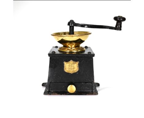 A late 19th Century coffee grinder with case iron body and polished brass bowl. Made by J&amp;J Siddons Ltd and stamped as a 