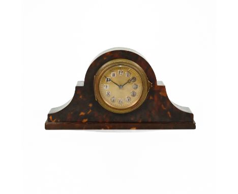 A small late 19th century single train mantle clock with platform escapement movement in a tortoiseshell Napolean's Hat shape
