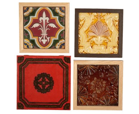 MINTON & CO: AN EMBOSSED GOTHIC REVIVAL MAJOLICA TILE possibly designed by A.W. Pugin, in rich colour tones, with a central a