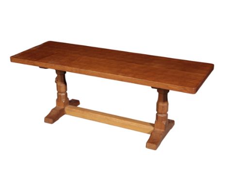 WORKSHOP OF ROBERT 'MOUSEMAN' THOMPSON (1876-1955): AN ENGLISH OAK REFECTORY STYLE COFFEE TABLE the adzed rectangular top on 