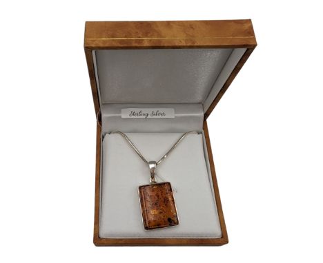 Silver rectangular Baltic amber pendant necklace, stamped 925, boxed Condition Report:Pendant length = 3cm, chain length = 44