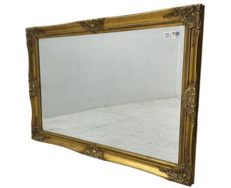 Swept gilt framed wall mirror with rectangular bevelled plateDimensions: Length/Width:&nbsp;105cm&nbsp; Depth/Diameter:&nbsp;