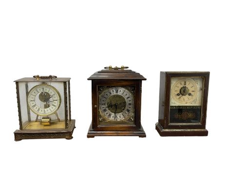 19th century American shelf clock with an alarm and two 20th century mantle clocks.