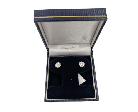Pair of silver cubic zirconia flower cluster stud earrings, stamped 925, boxed Condition Report:D = 7mm