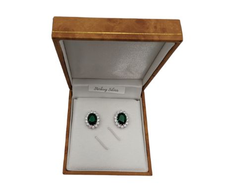 Pair of silver cubic zirconia and green stone oval cluster stud earrings, stamped 925, boxed Condition Report:L = 1.4cm