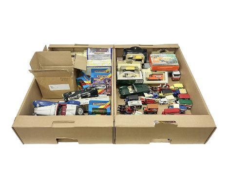 Quantity of boxed and loose die-cast cars to include a Dinky Fire Engine, Burago, Matchbox, Lledo etc in two boxes 