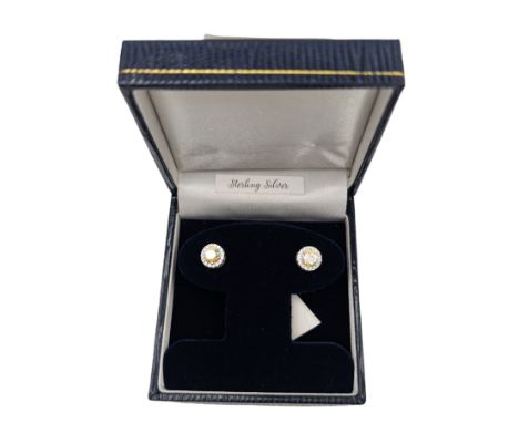 Pair of round silver cubic zirconia cluster stud earrings, stamped 925, boxed Condition Report:D = 8mm