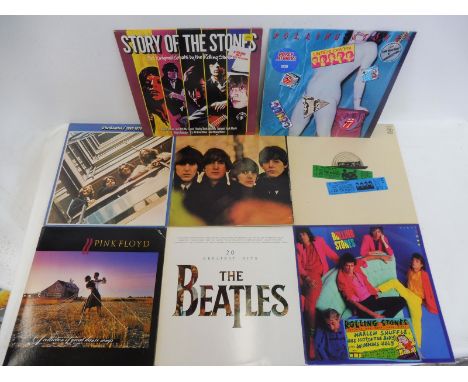 Seven vinyl albums, Beatles and Rolling Stones, various conditions.