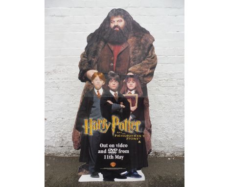 A Harry Potter and the Philosopher's Stone life-size die-cut shop display, originally from Woolworths, 27 1/2 x 60". 