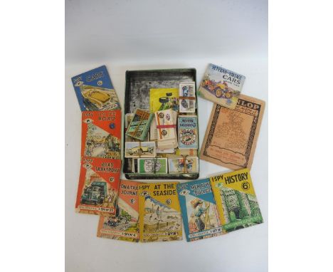 Seven early I-Spy books and a selection of cigarette cards etc; also a Dunlop No. 19 Touring Map.