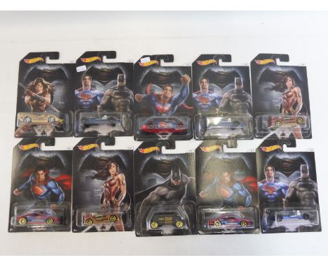 Ten Hot Wheels Batman and Superman carded vehicles.