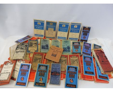 A quantity of maps to include Bartholomews, Ordnance Survey etc.