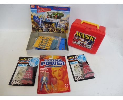 A quantity of carded figures to include Captain Power by Mattel, Darleks by Dapol etc.