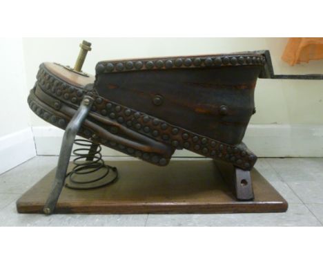 Late 19thC light oak and studded brown hide, foot operated 'British Alcosa Bellows'       SR