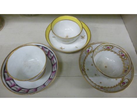 Three late 18thC New Hall porcelain tea bowls and saucers, viz. the first, decorated in black and pink with panel scrolled de