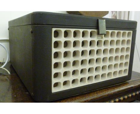 A late 1950s/60s Deccalian (No.31778) record player, in a chocolate brown coloured fabric covered case          CA