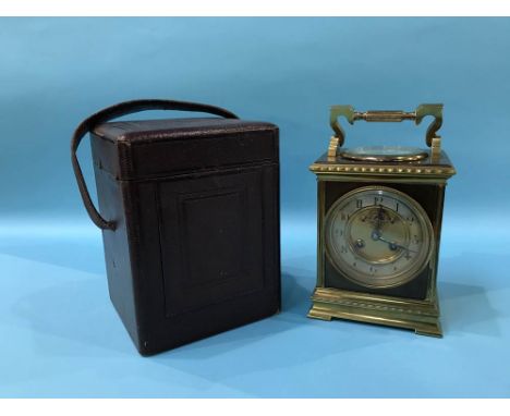A Continental mantel clock with eight day movement and strike action, the top has a circular dial with thermometer and compas