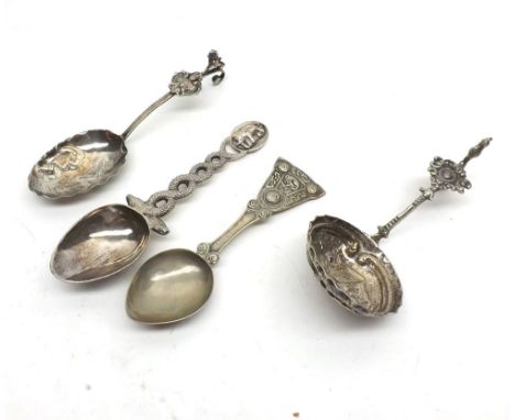 A Mixed Lot comprising: an Iona Caddy Spoon, Maker's Mark IWC, 5" long; two Dutch Silver Decorative Spoons, one embossed with
