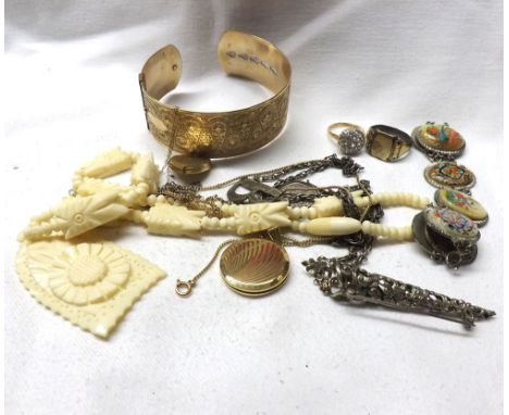 A packet of assorted jewellery items including Ethnic Bone Necklace, Bangle, two gold plated Lockets, Rings etc (qty)