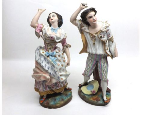 Pair of late 19th Century Continental Parian type figures of young man and woman in period dress, raised on plinth bases, no 