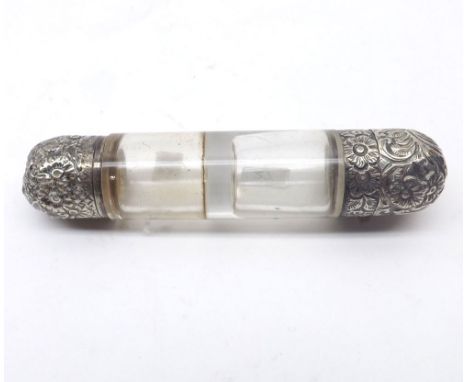 A Victorian Double Clear Glass Scent Bottle with domed foliate and floral engraved lids, 4" tall, apparently unmarked&nbsp;
C