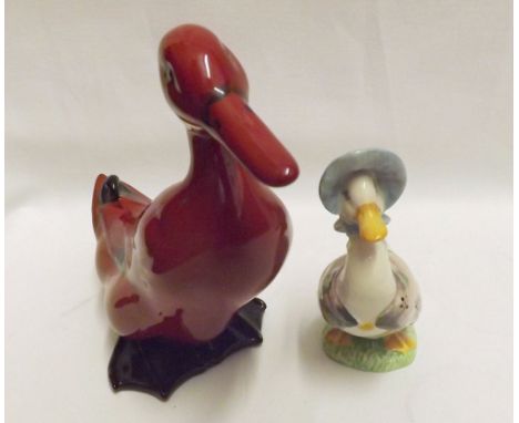 A Royal Doulton Flamb Model of a Duck; together with a further Beswick Beatrix Potter Model "Jemima Puddleduck", 6" and 4" hi