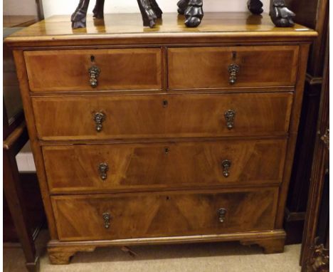 An 18th Century Walnut Veneered Chest of two short and three long drawers, fitted with brass drop handles (replacement), rais