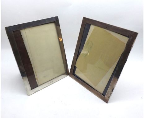 A pair of plain rectangular George VI Silver Photograph Frames with wooden easel backs, dated 1937 and initialled JRG and ERG