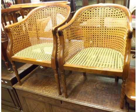 Unusual pair of Edwardian Mahogany framed bow back child's Bergere chairs, raised on barley twist front legs, 1ft 6" wide  