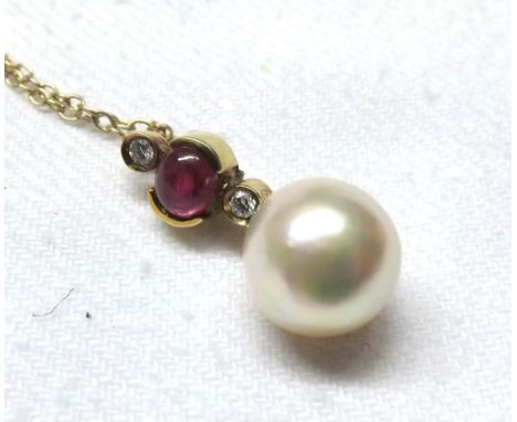 An Oriental Pearl Pendant with Ruby and Diamond mounts, hallmarked 14ct gold setting and chain, pearl 9mm diameter