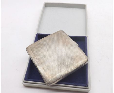 George V Silver Cigarette Case of hinged form, the body with engine turned decoration, hallmarked Chester 1933, weight approx