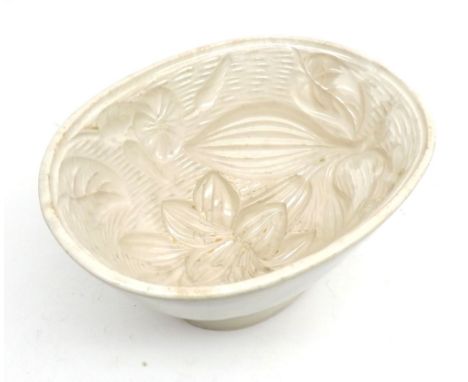 A vintage Wedgwood Ceramic Jelly Mould, the interior decorated with various flowers, 7 1/4" wide 