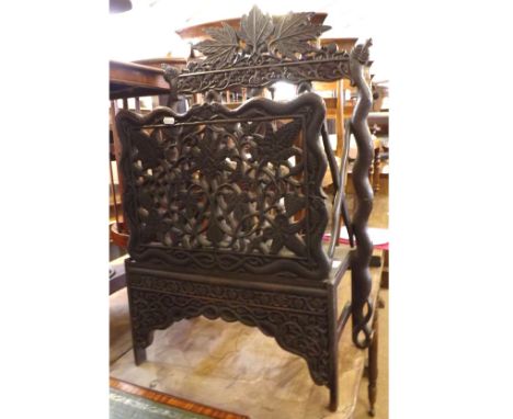 Unusual late 19th or early 20th Century Burmese Hardwood Magazine Rack of rectangular form, decorated with pierced foliate an