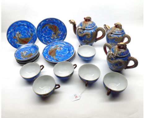 Japanese Eggshell tea service, the teapot, two handled covered sugar bowl and hot water jug all with dragon finials, handles 