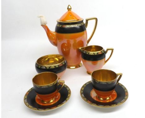 Carlton ware Tea Service registered number 721741, decorated with lustre finish on an orange, black and gilt background, comp