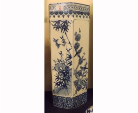 Chinese Stick Stand of hexagonal form, decorated throughout in underglaze blue with panels of birds amidst foliage within geo