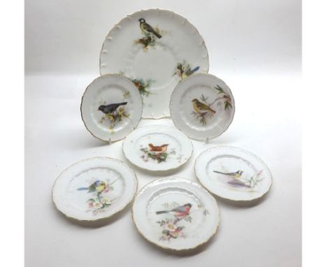Collection of Royal Worcester wares comprising a 9" Plate and six 5" Dishes, all with painted bird decoration, signed W Powel