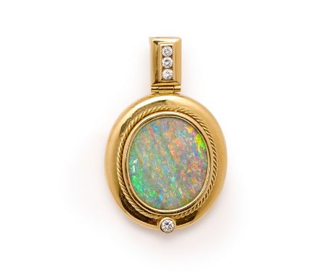 BOULDER OPAL AND DIAMOND PENDANT collet set with an oval boulder opal with rope work detail, with single diamond accent, to a