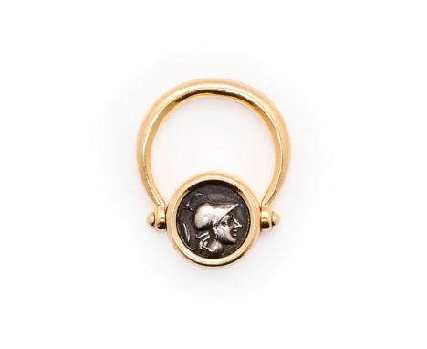 BULGARI: ANCIENT COIN RING/PENDANT, 2ND CENTURY BC AND 1980s the rotating bezel inset with an ancient silver coin, the bezel 