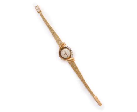 UNIVERSAL, GENEVA: LADYS DIAMOND COCKTAIL WATCH, 1960s the circular dial applied with Arabic numerals and baton indicators, t