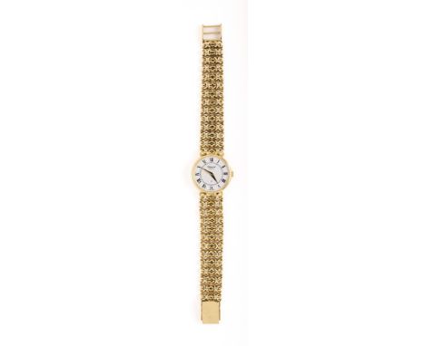 CHOPARD: LADY'S GOLD BRACELET WATCH, SWISS, CIRCA 1969 17 jewel manual wind movement, white dial with Roman numerals, circula
