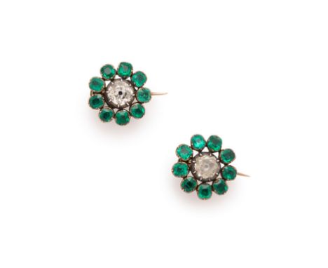 GEORGIAN, PAIR OF EMERALD AND DIAMOND BROOCHES, 1800s each of cluster design centring on a foil backed old mine-cut diamond m