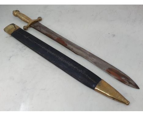 A 19th Century Russian Artillery saw-backed Side Arm with brass grip and leather brass mounted scabbard 2ft 3in L overall 