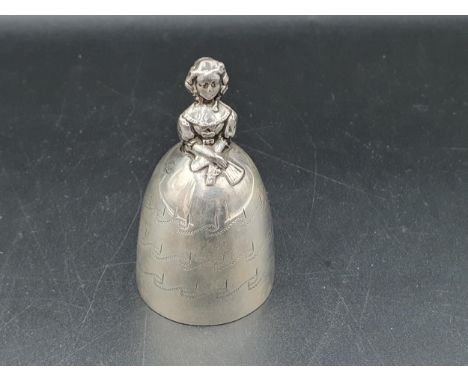 A George V silver Crinoline Bell with engraved decoration, the clappers modeled as two legs, London &amp; Birmingham 1924, ma