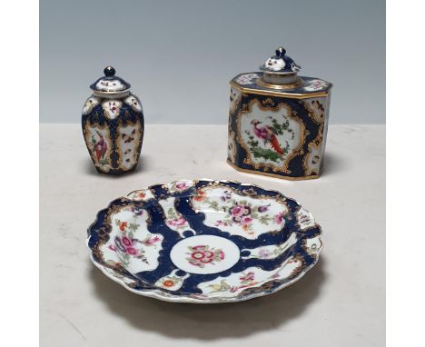 A Worcester Plate with shaped rim, floral panels with blue and gilt borders, surface scratches, small chip to rim, 7 1/2in, a